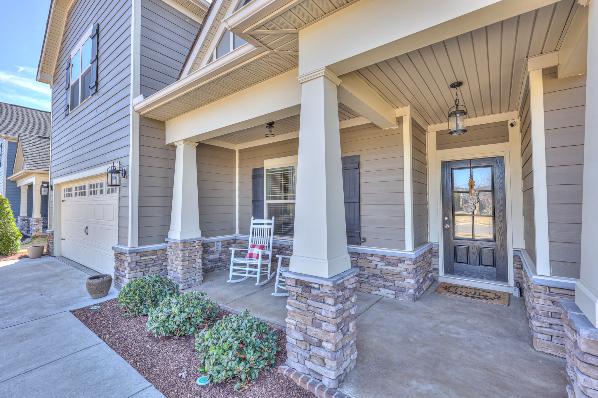 1011 Licinius Lane Murfreesboro, TN 37128 - Photo 3 of 31 a front view of a house with outdoor seating