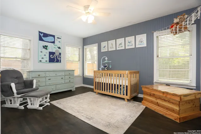 a bedroom with a workspace