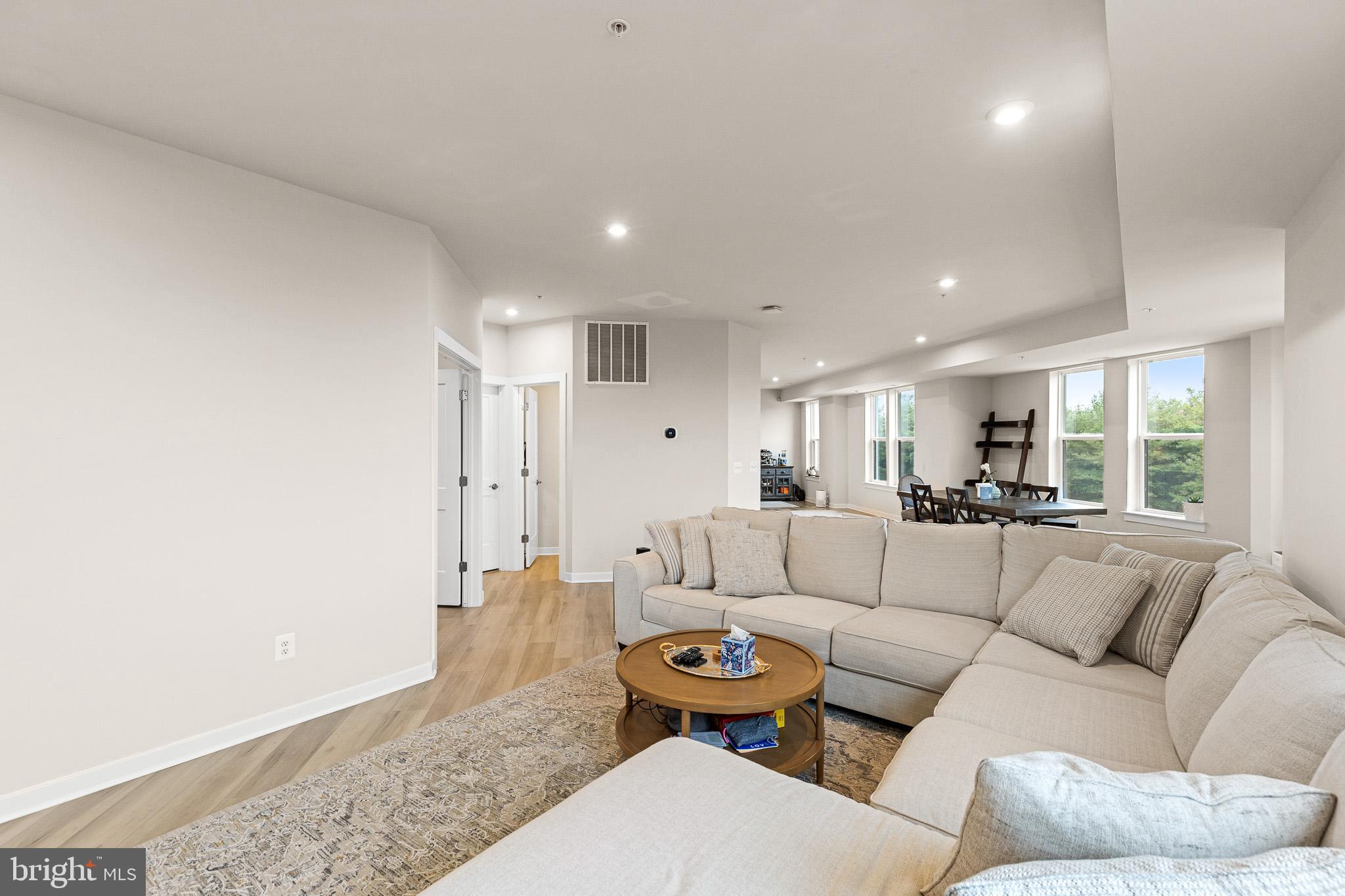 43769 Transit Square Ashburn, VA 20147 - Photo 12 of 36 a living room with furniture and a large window
