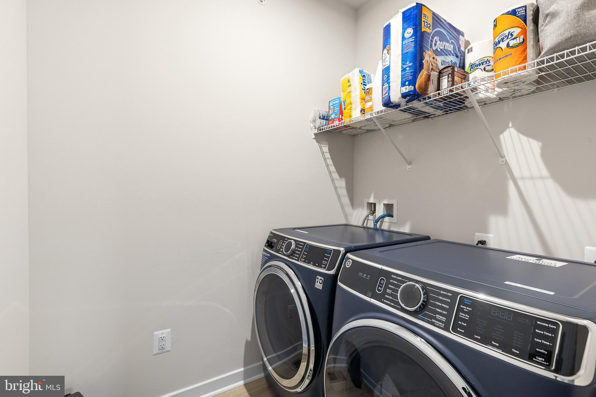 43769 Transit Square Ashburn, VA 20147 - Photo 25 of 36 a utility room with dryer and washer