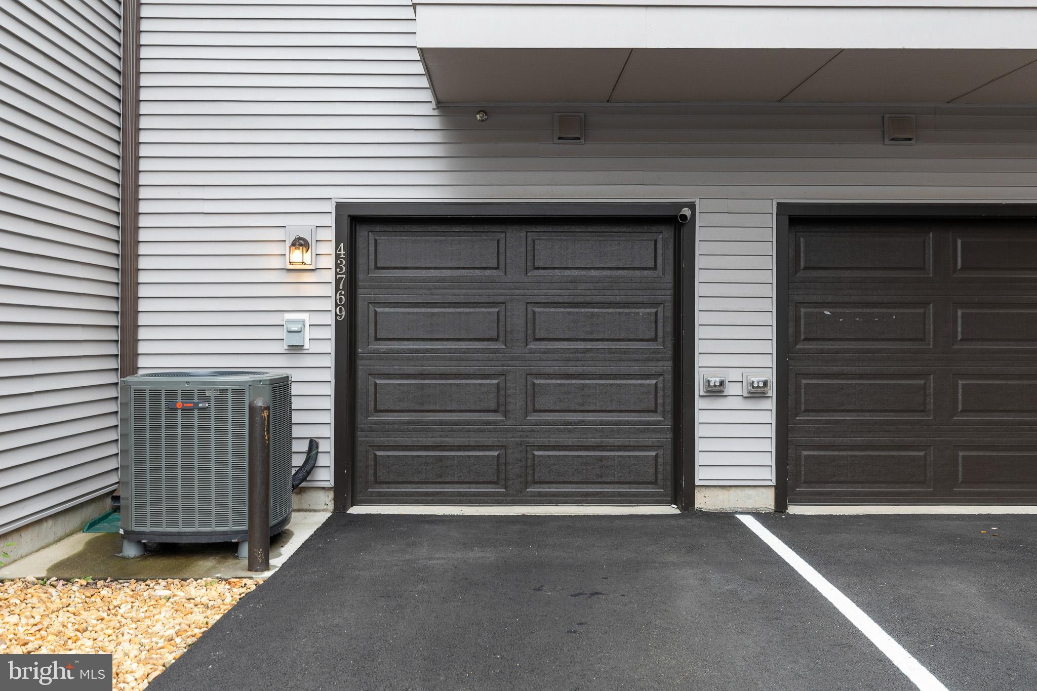 43769 Transit Square Ashburn, VA 20147 - Photo 28 of 36 a view of outdoor space garage and window