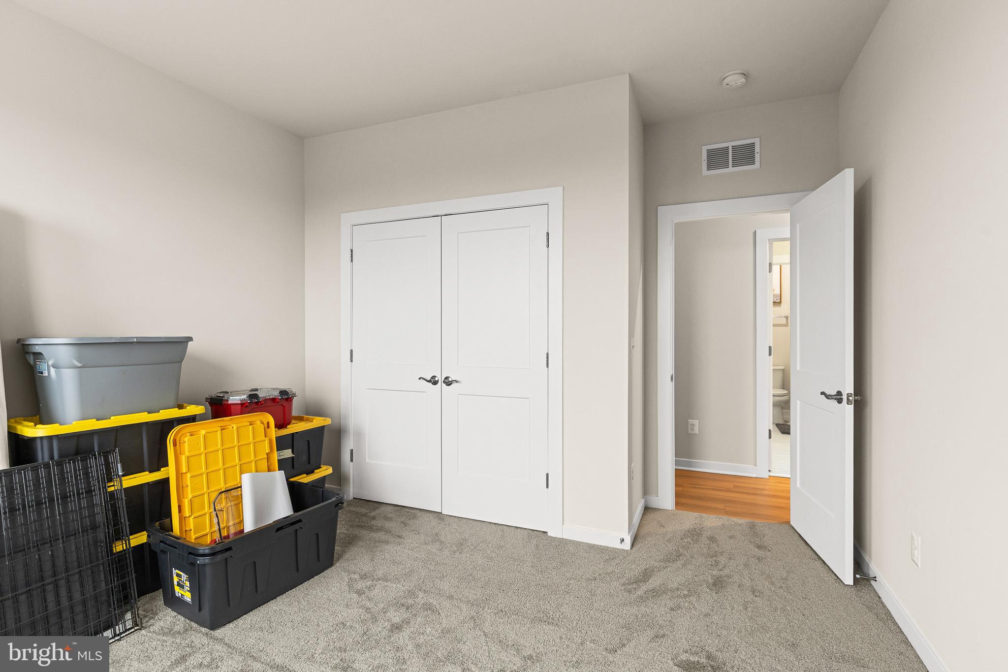 43769 Transit Square Ashburn, VA 20147 - Photo 31 of 36 wooden floor and closet in a room