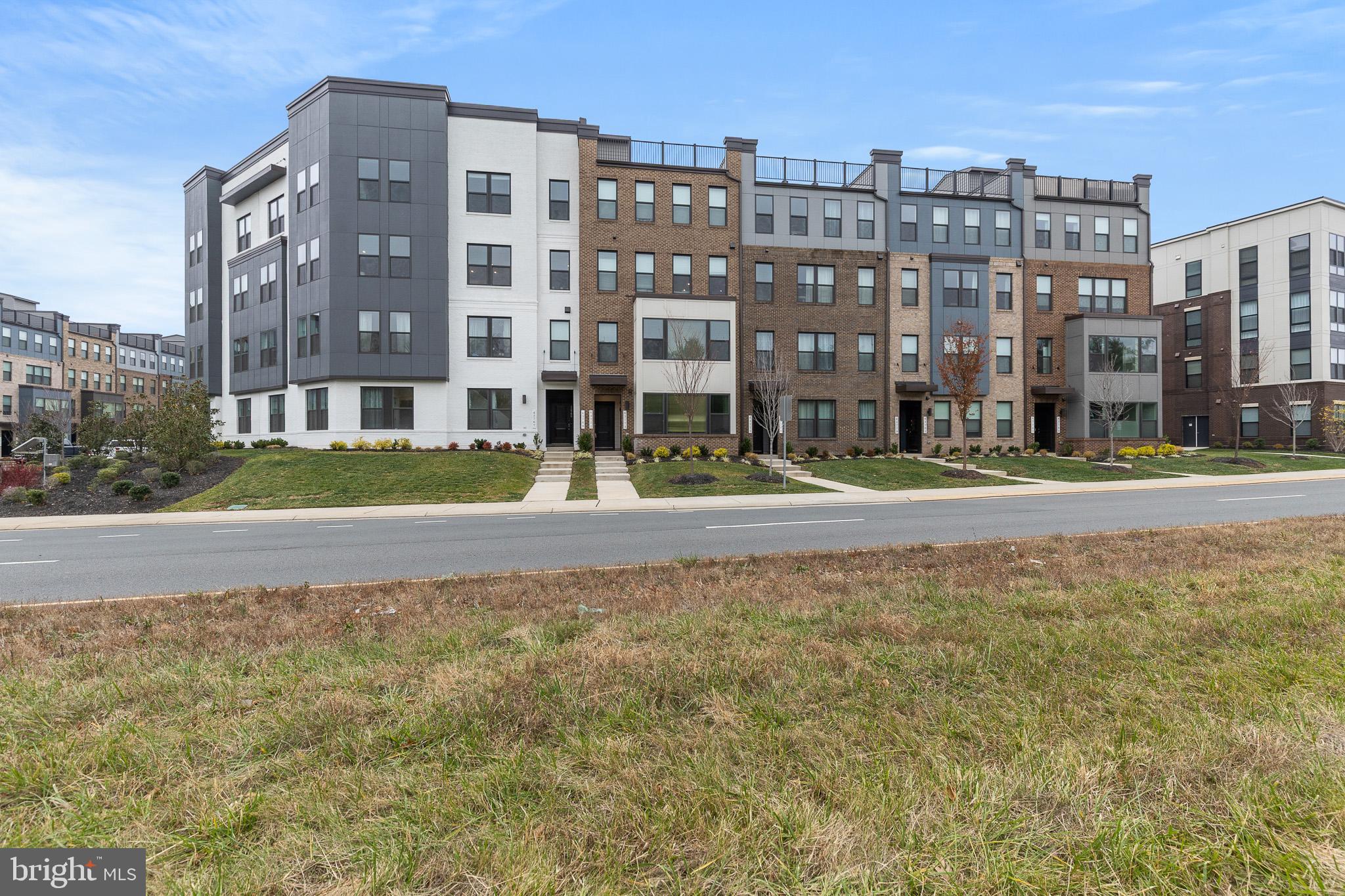 43769 Transit Square Ashburn, VA 20147 - Photo 32 of 36 a view of buildings with a street
