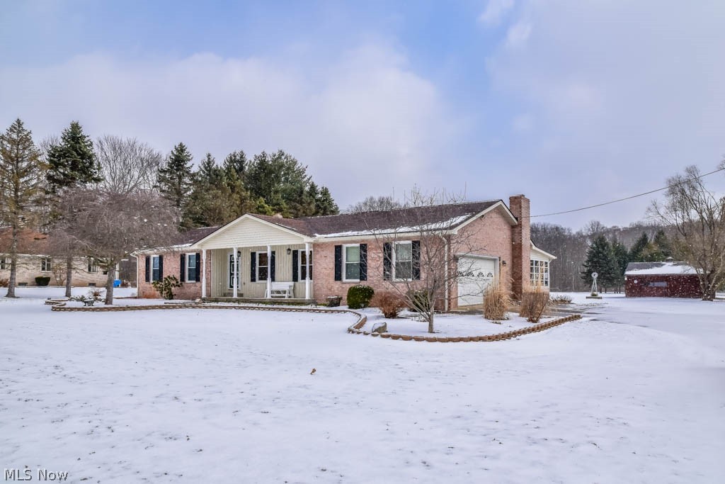 6094 Hanna Road Ravenna, OH 44266 - Photo 1 of 31 Beautiful 3 bedroom, 3 full bath ranch on 4.4 acres in a gorgeous, private country setting!