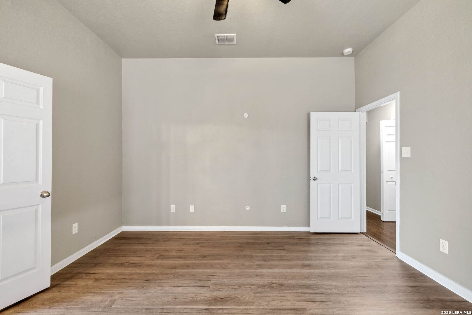4015 Shervin Way Converse, TX 78109 - Photo 22 of 43 a view of an empty room with wooden floor