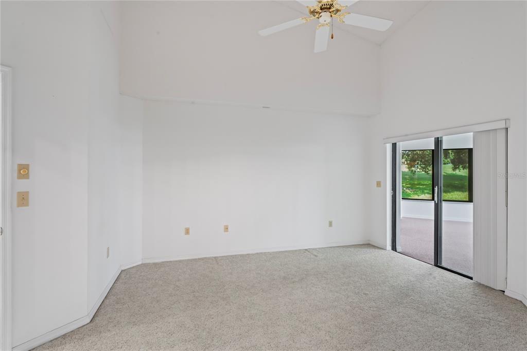 9108 Bassett Lane, Unit B New Port Richey, FL 34655 - Photo 23 of 66 a view of an empty room with a window