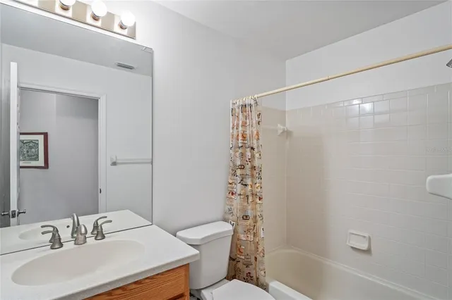 a view of a golf course with a trees