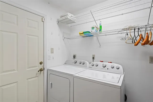 a view of the house with a swimming pool