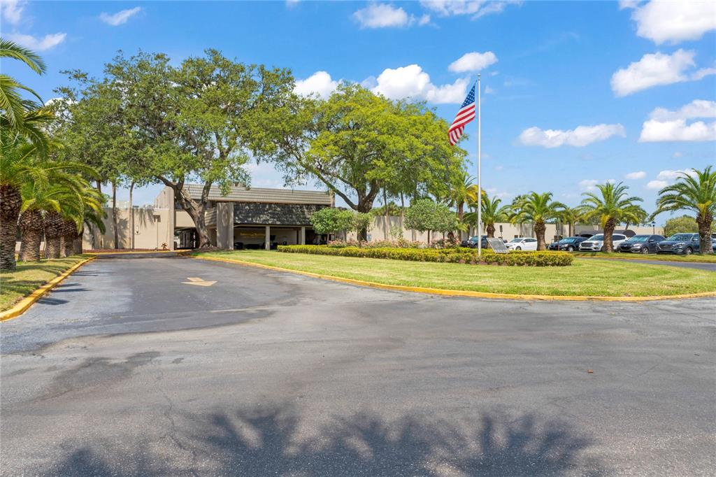 9108 Bassett Lane, Unit B New Port Richey, FL 34655 - Photo 43 of 66 a view of the house with a swimming pool