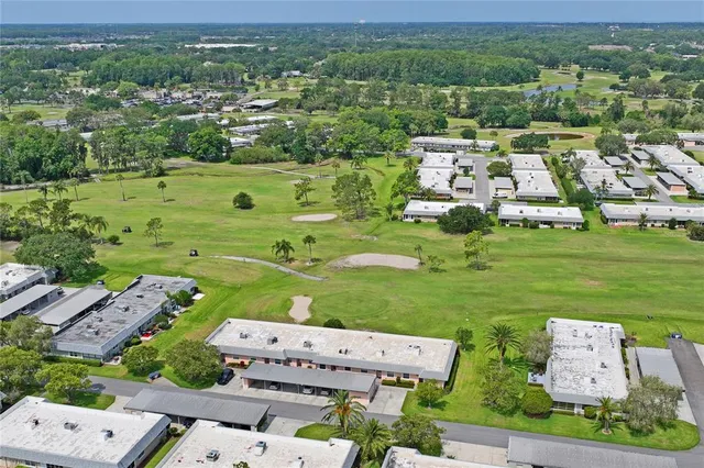 a view of a golf course with a fountain