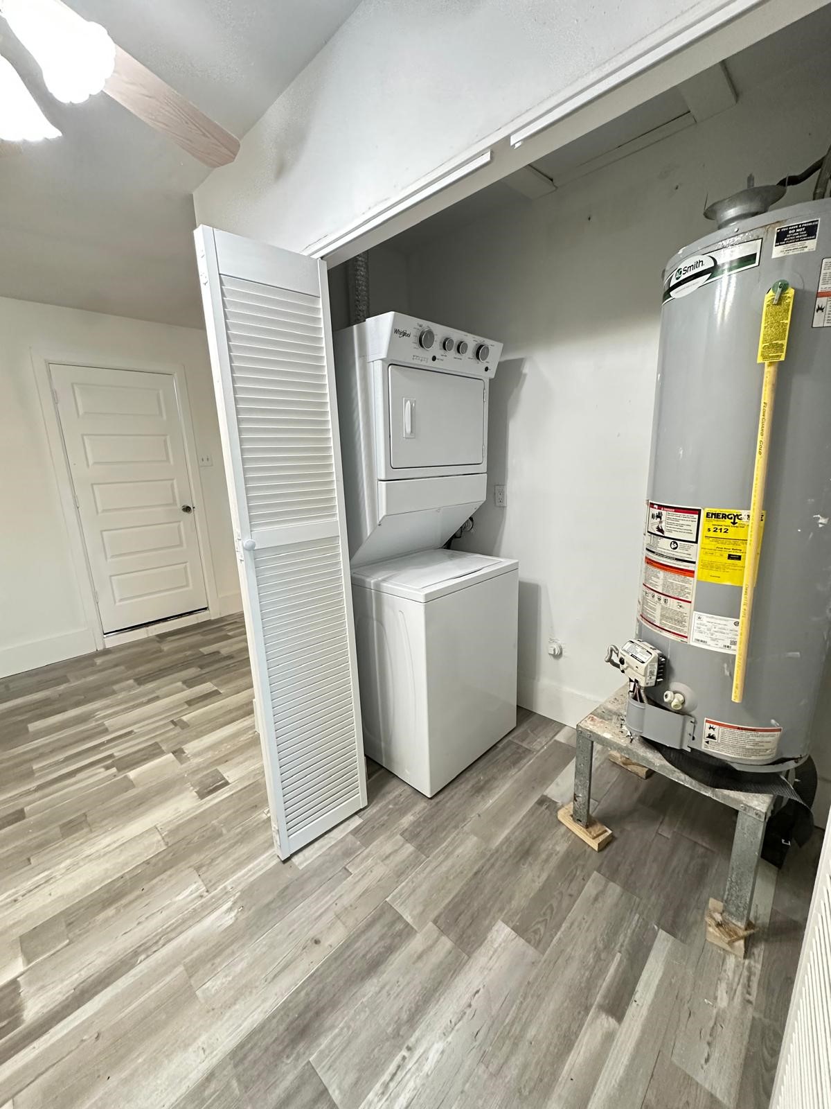 600 West Mimosa Street Angleton, TX 77515 - Photo 5 of 18 a room with storage and utility