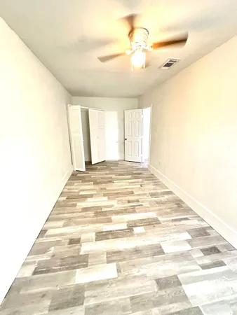 a view of an empty room and window