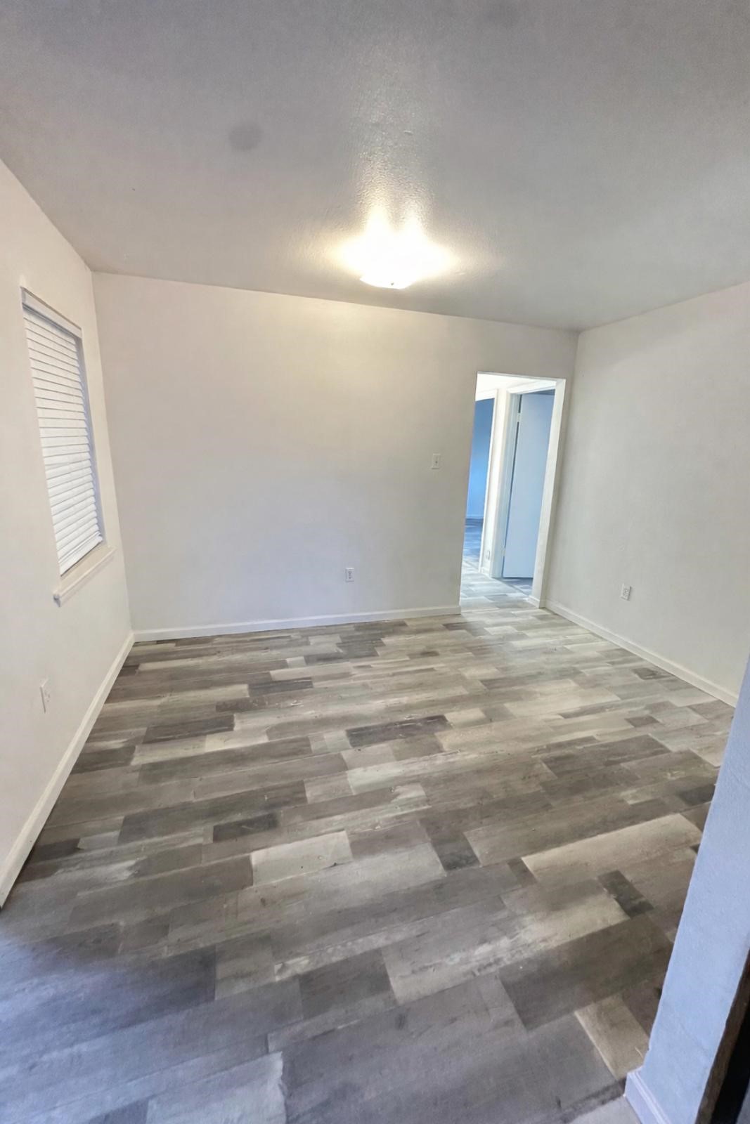 600 West Mimosa Street Angleton, TX 77515 - Photo 10 of 18 a view of an empty room