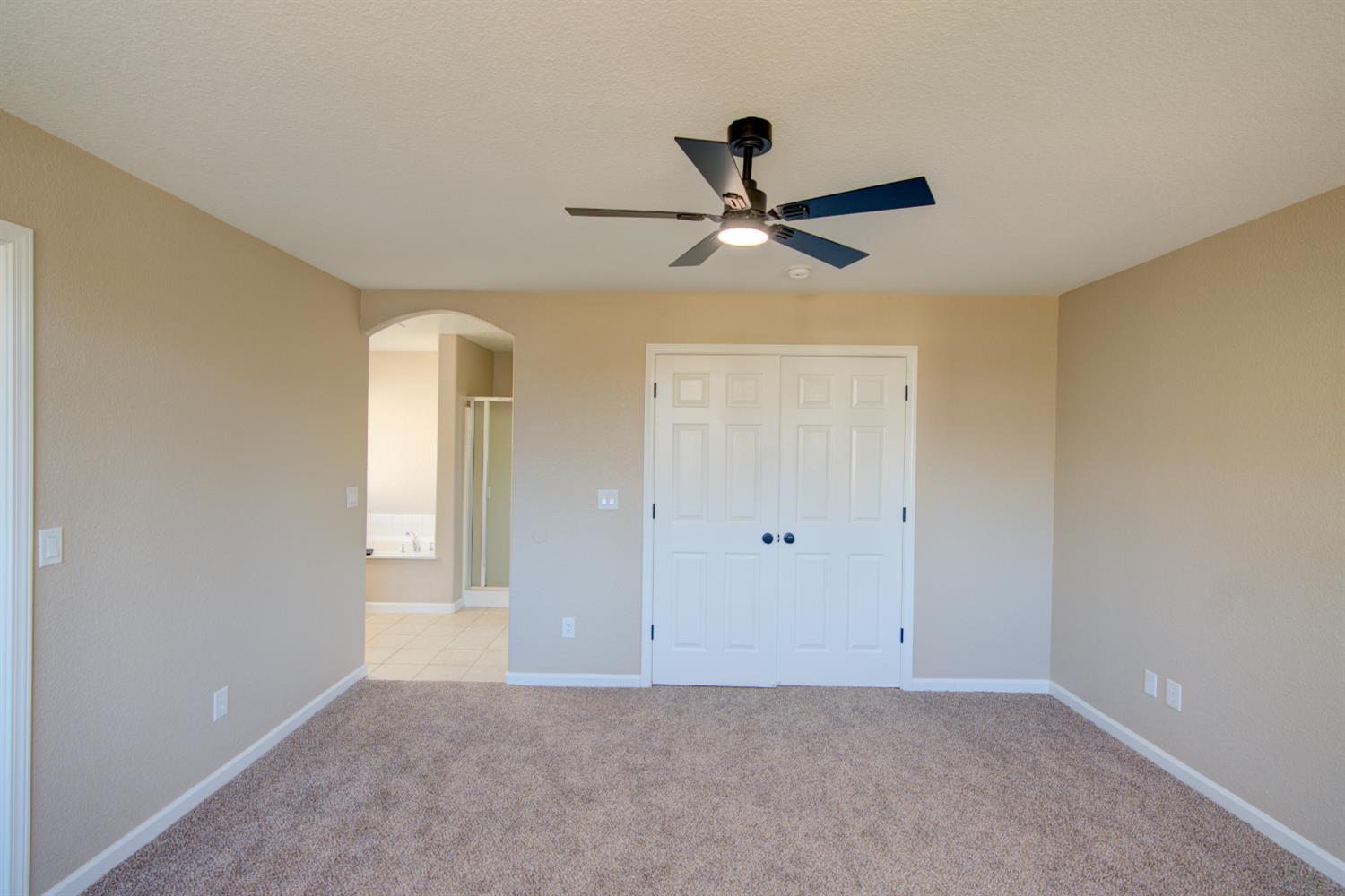 3546 Paseo Verde Avenue Merced, CA 95348 - Photo 15 of 24 a view of a big room with carpet