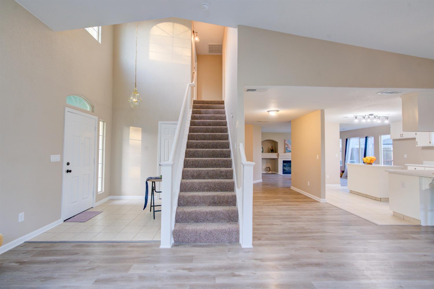 3546 Paseo Verde Avenue Merced, CA 95348 - Photo 3 of 24 a view of a living room and entryway