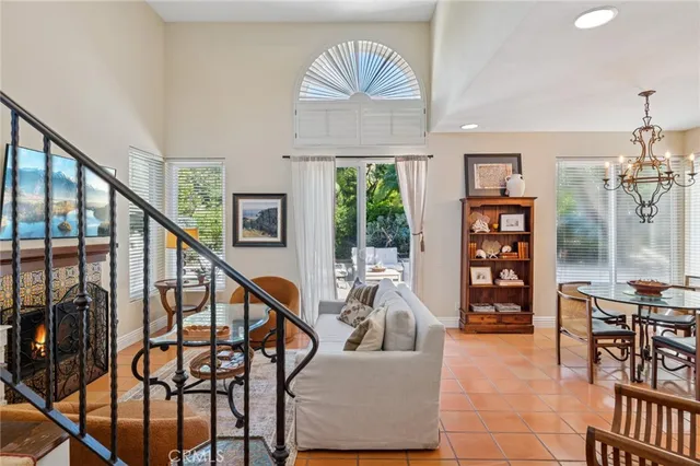 a kitchen with stainless steel appliances granite countertop a stove top oven a refrigerator a sink and dishwasher