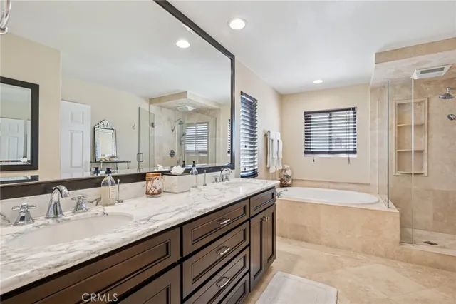 a bedroom with a bed and a table