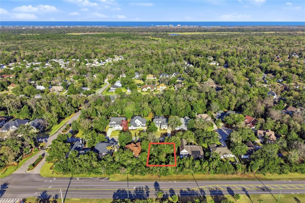 7 St Charles Place Flagler Beach, FL 32136 - Photo 2 of 10 a view of a green field