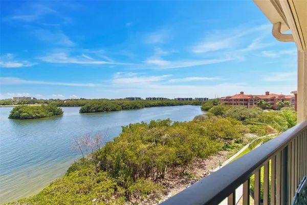 a view of a lake from a balcony