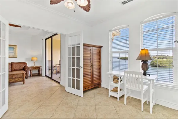 a living room filled with furniture and a window