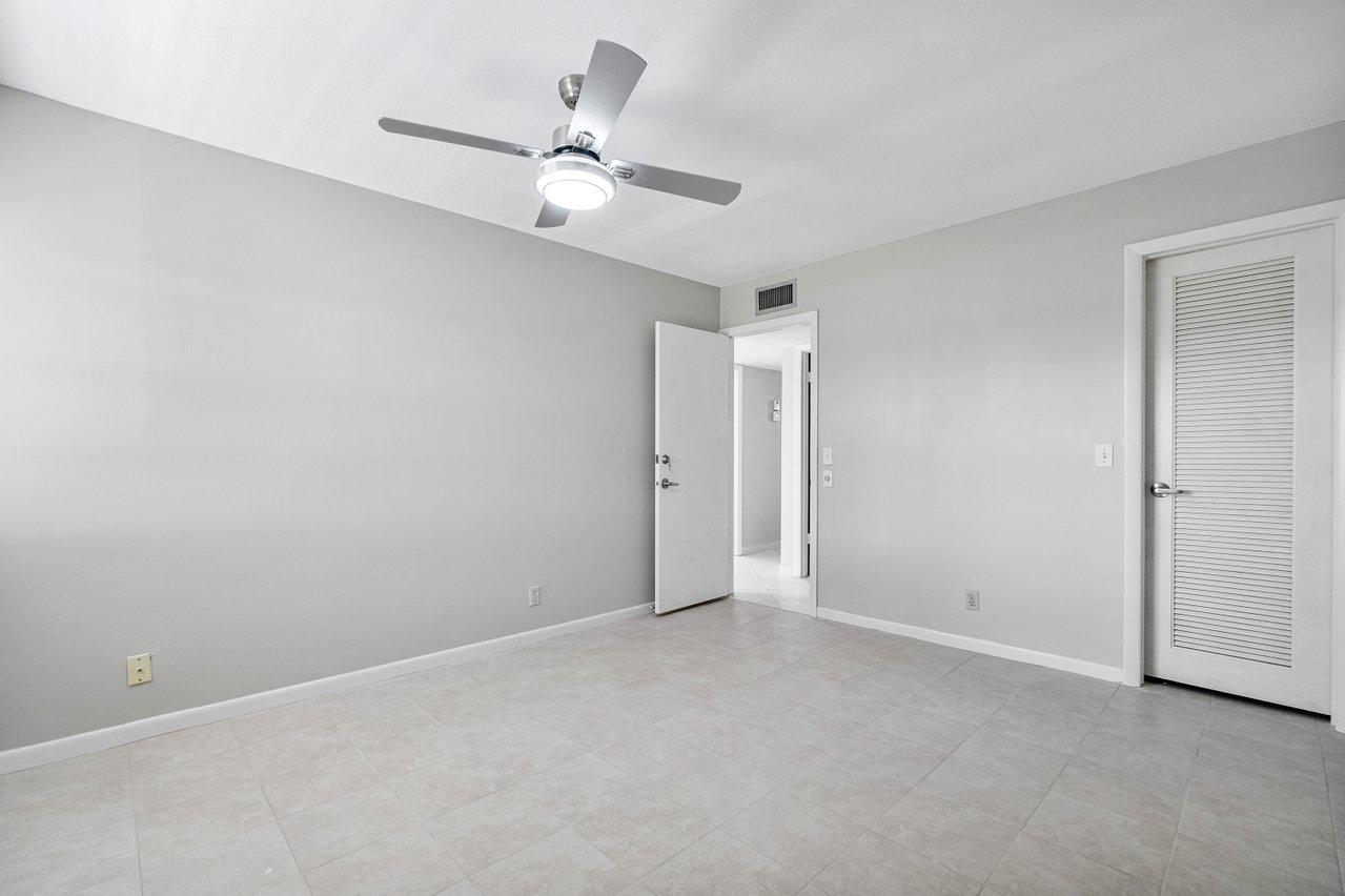 77 Normandy B Delray Beach, FL 33484 - Photo 11 of 34 a view of an empty room