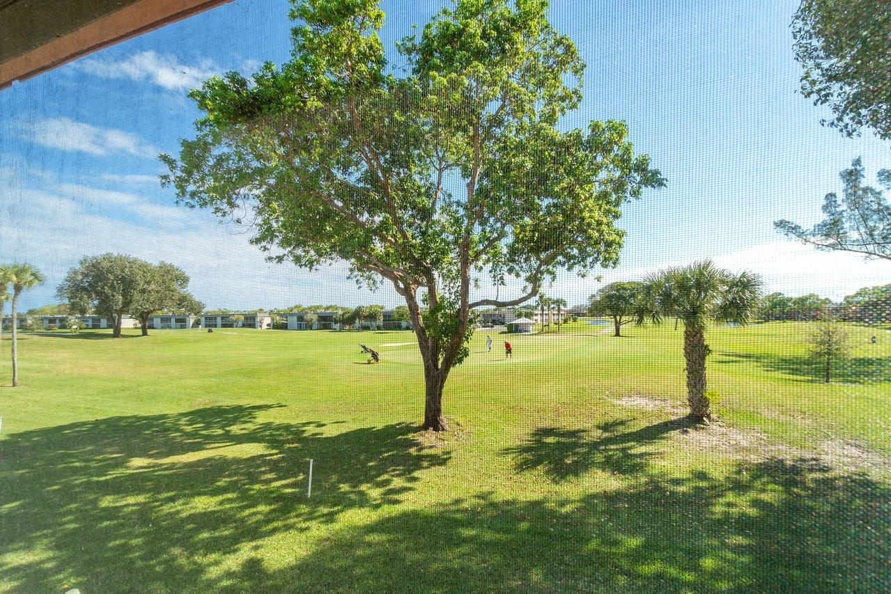 77 Normandy B Delray Beach, FL 33484 - Photo 17 of 34 a view of an ocean from a building