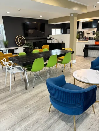 a living room with furniture and a flat screen tv
