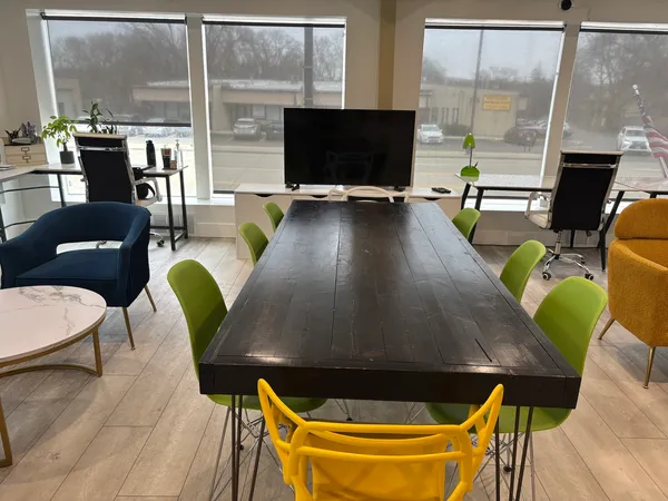 a living room with furniture and a table