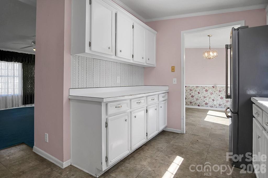 620 Anthony Grove Road Cherryville, NC 28021 - Photo 14 of 32 a view of a kitchen with refrigerator