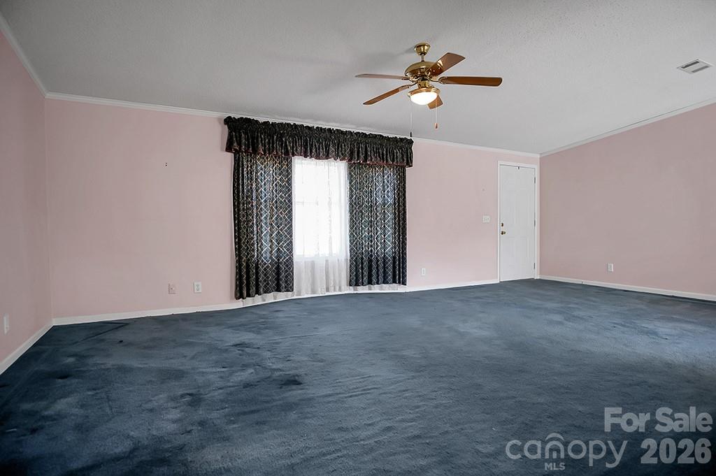 620 Anthony Grove Road Cherryville, NC 28021 - Photo 5 of 32 a view of an empty room with a window