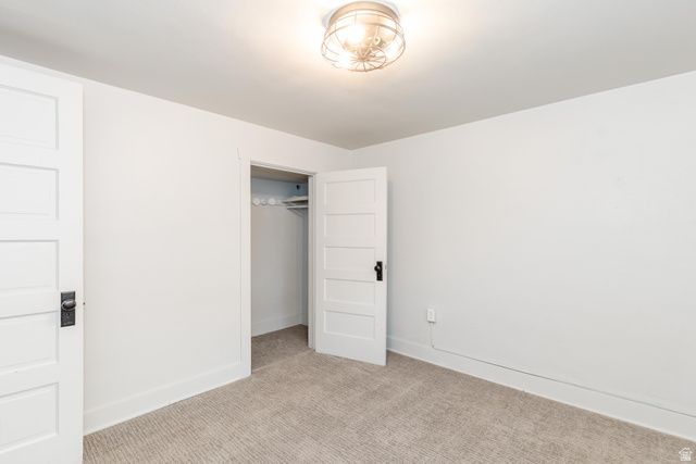 227 West 200 North Logan, UT 84321 - Photo 29 of 44 Neutral-toned carpeting paired with white walls