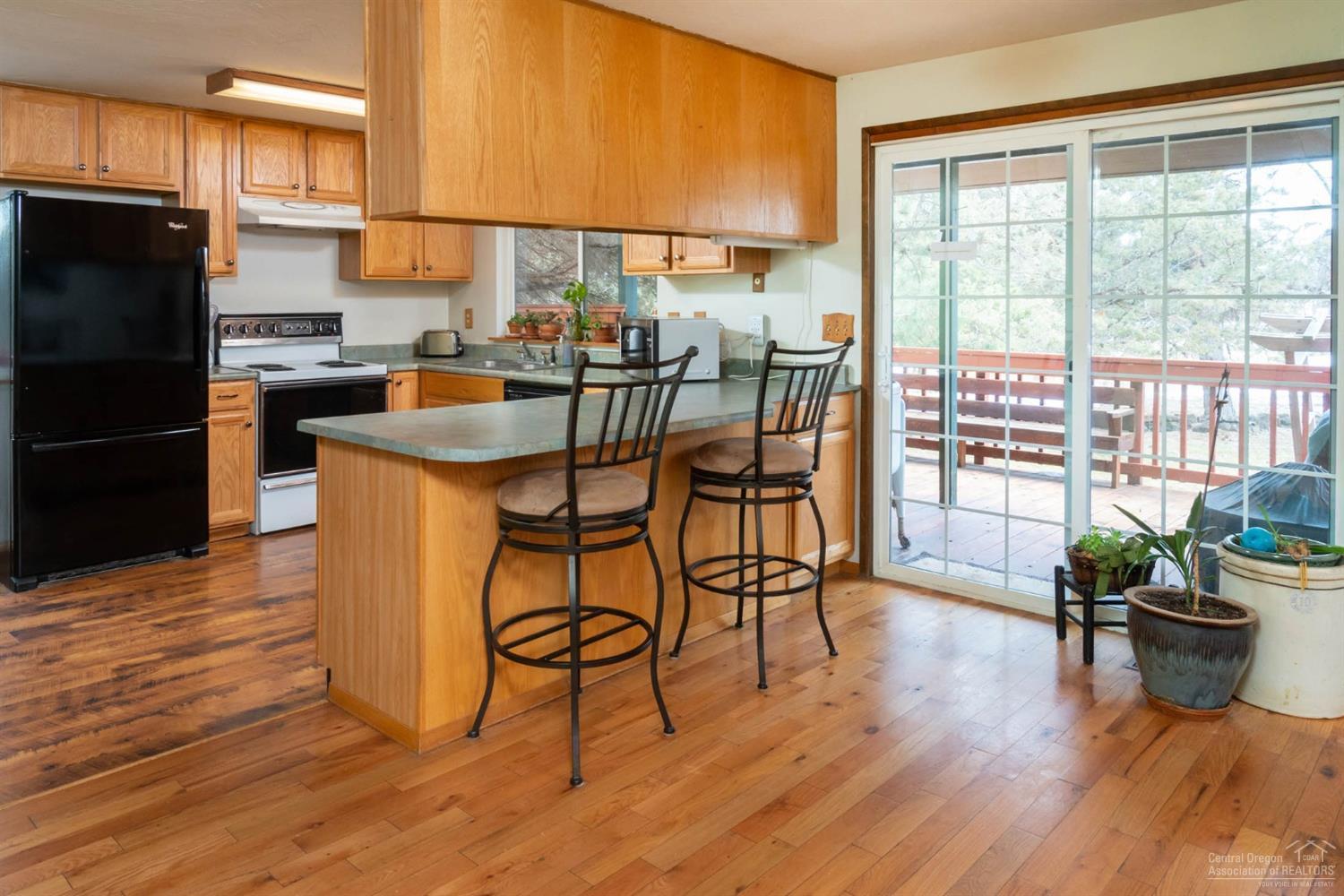 21452 Keyte Lane Bend, OR 97701 - Photo 16 of 25 Breakfast bar is so convenient.
