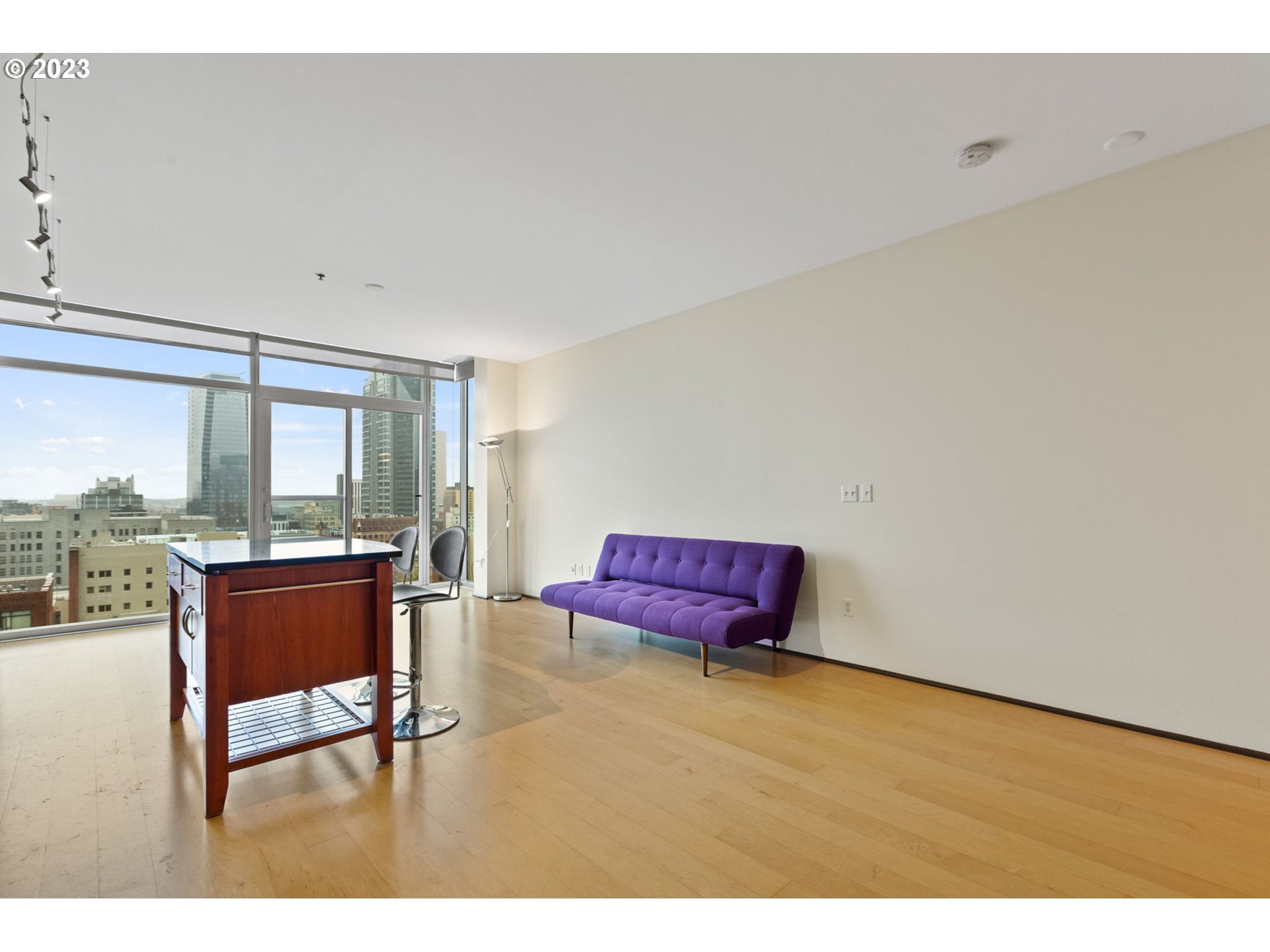 1221 Southwest 10th Avenue, Unit 914 Portland, OR 97205 - Photo 14 of 25 a living room with furniture