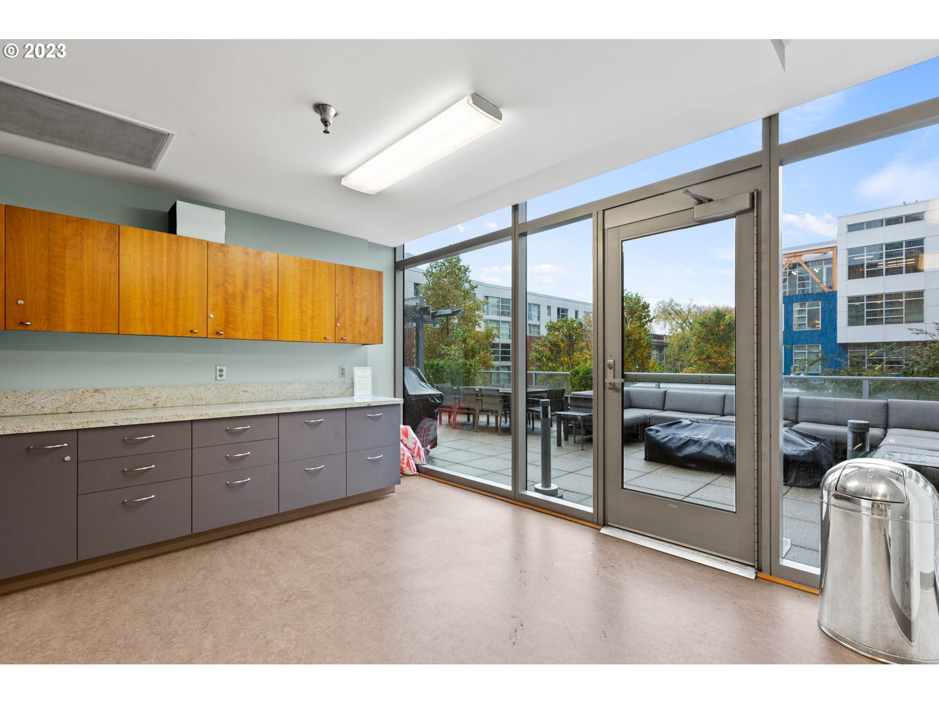 1221 Southwest 10th Avenue, Unit 914 Portland, OR 97205 - Photo 15 of 25 a room with window and couch