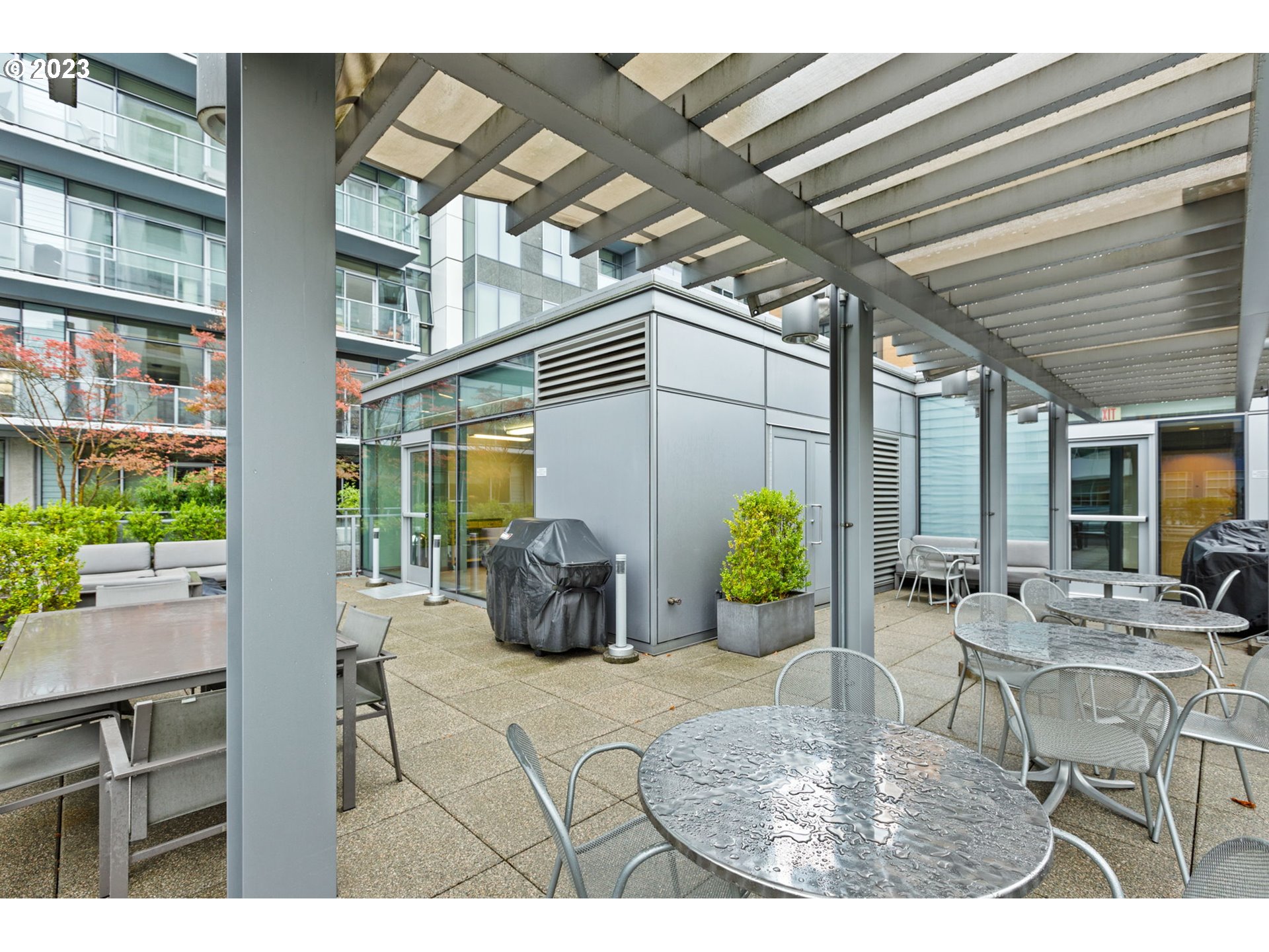 1221 Southwest 10th Avenue, Unit 914 Portland, OR 97205 - Photo 16 of 25 a view of a dining room with furniture window and outside view