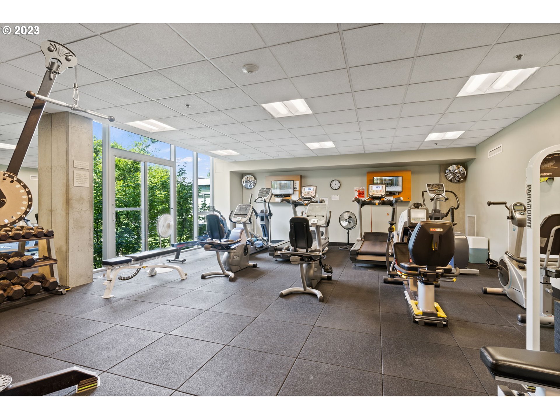 1221 Southwest 10th Avenue, Unit 914 Portland, OR 97205 - Photo 19 of 25 a view of a room with gym equipment