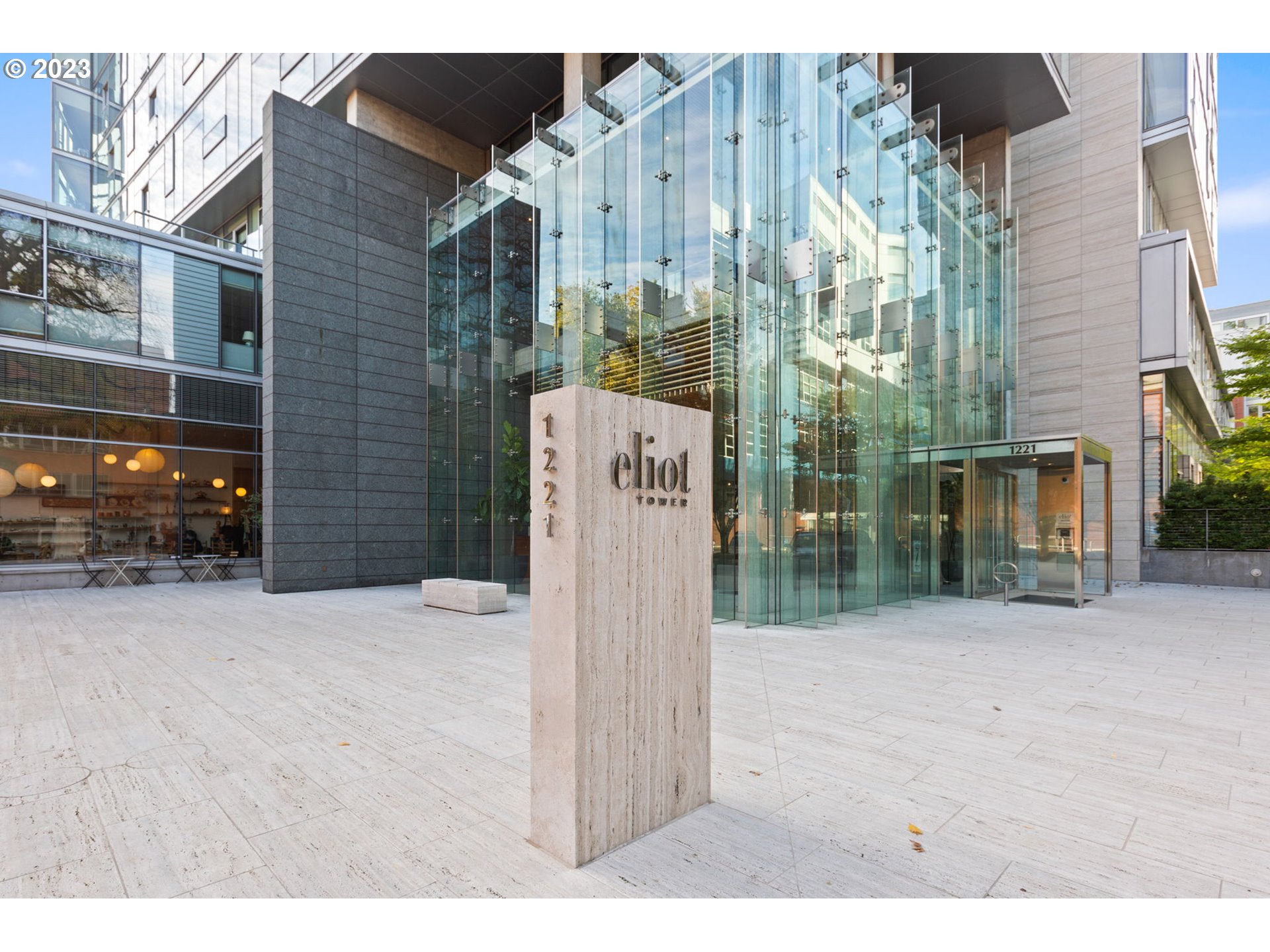 1221 Southwest 10th Avenue, Unit 914 Portland, OR 97205 - Photo 2 of 25 a sign board on the side of a street