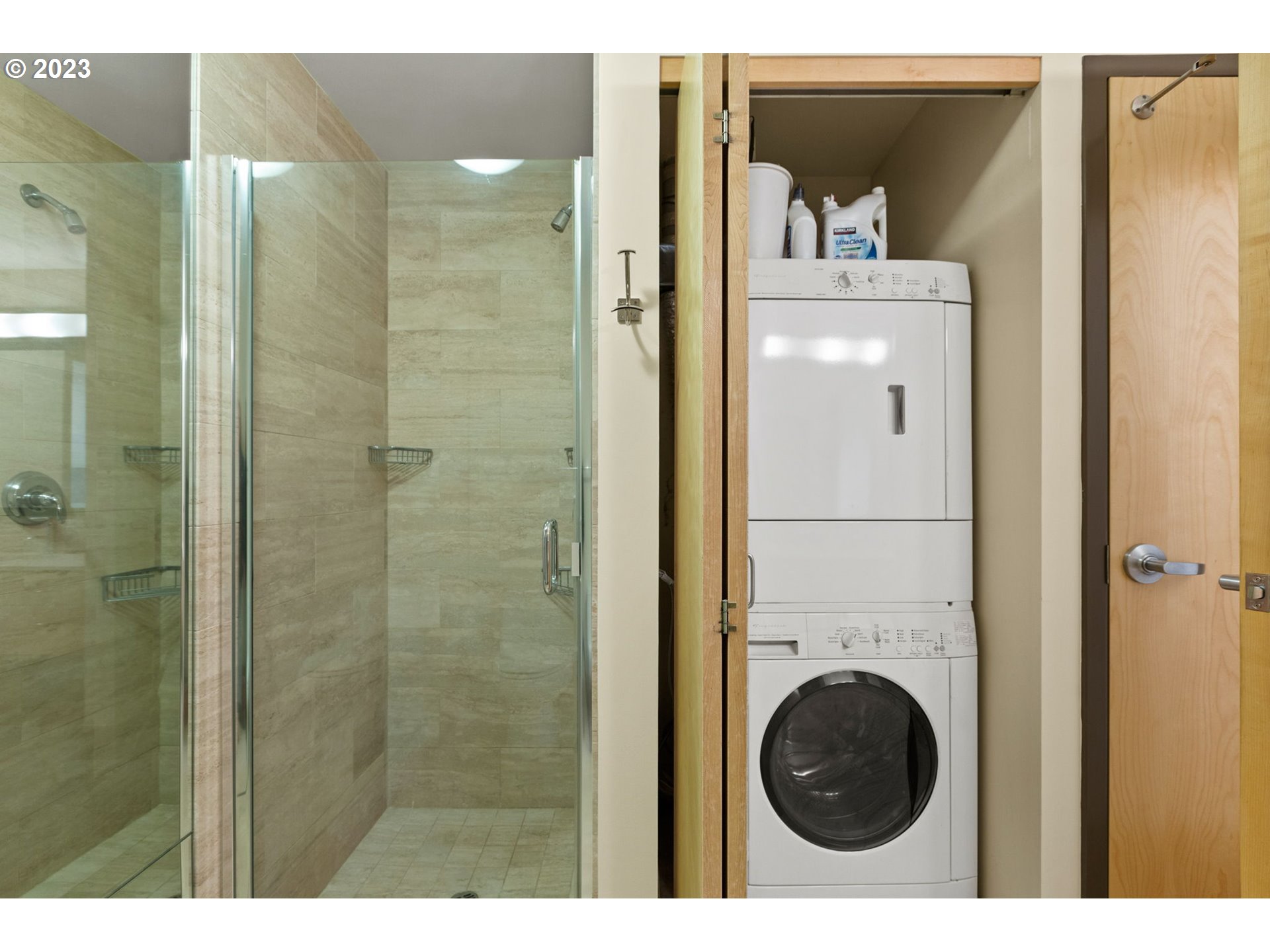 1221 Southwest 10th Avenue, Unit 914 Portland, OR 97205 - Photo 6 of 25 a bathroom with a shower and mirror