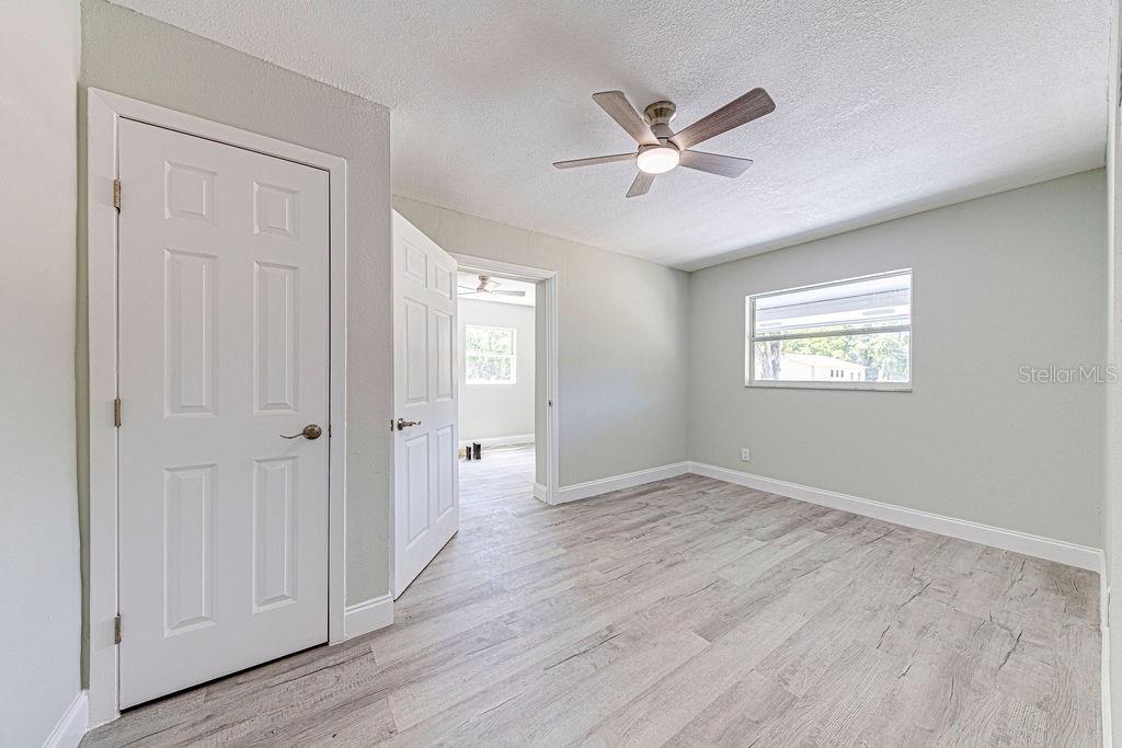1133 Hermit Smith Road Apopka, FL 32712 - Photo 11 of 34 a view of an empty room with a window