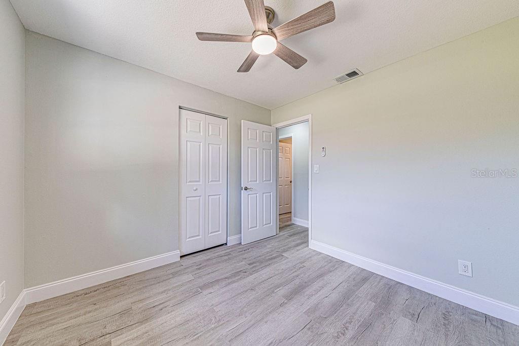 1133 Hermit Smith Road Apopka, FL 32712 - Photo 17 of 34 wooden floor in an empty room