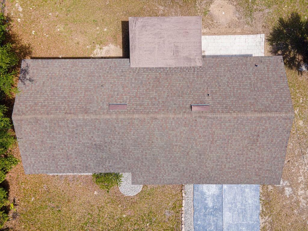 1133 Hermit Smith Road Apopka, FL 32712 - Photo 28 of 34 a bathroom with a bathtub