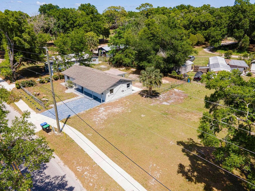 1133 Hermit Smith Road Apopka, FL 32712 - Photo 29 of 34 an aerial view of residential houses with outdoor space