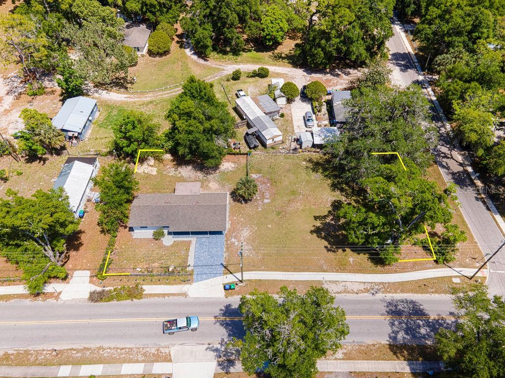 1133 Hermit Smith Road Apopka, FL 32712 - Photo 33 of 34 an aerial view of residential houses with outdoor space and parking