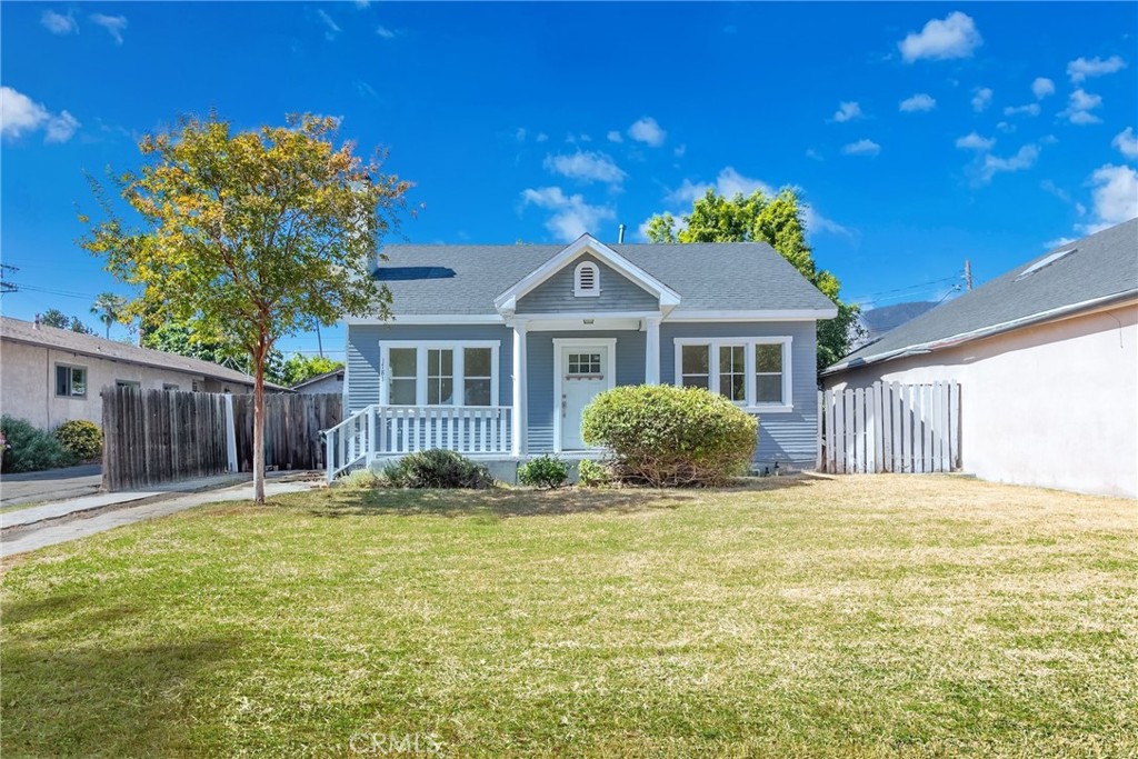 a house with swimming pool in front of it