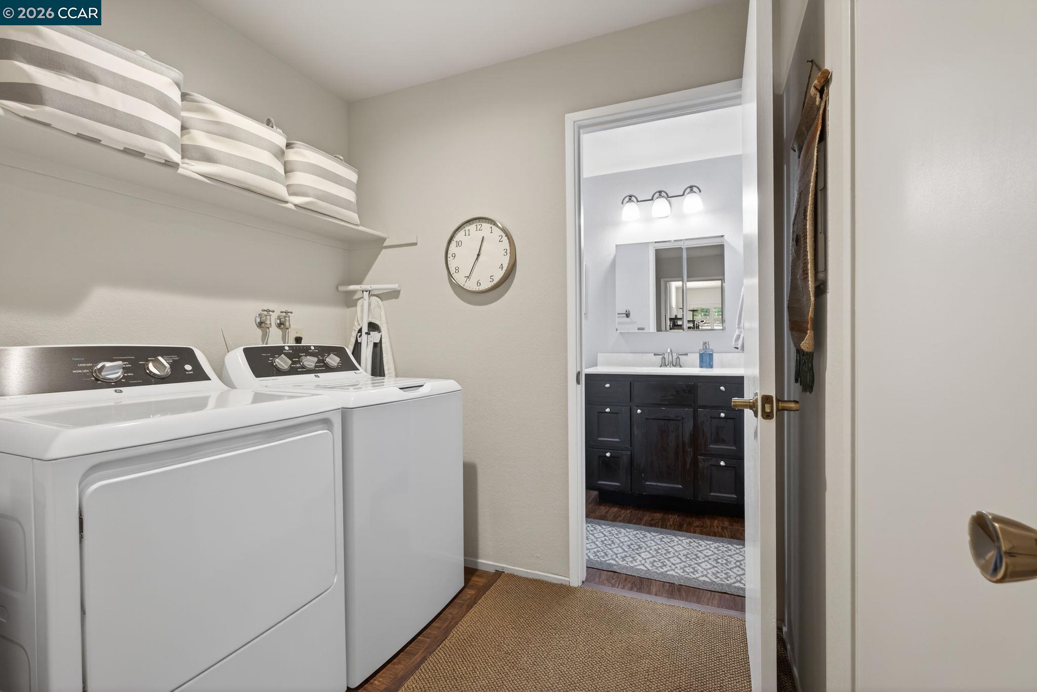 5015 Valley Crest Drive, Unit 121 Concord, CA 94521 - Photo 12 of 30 a utility room with dryer and washer
