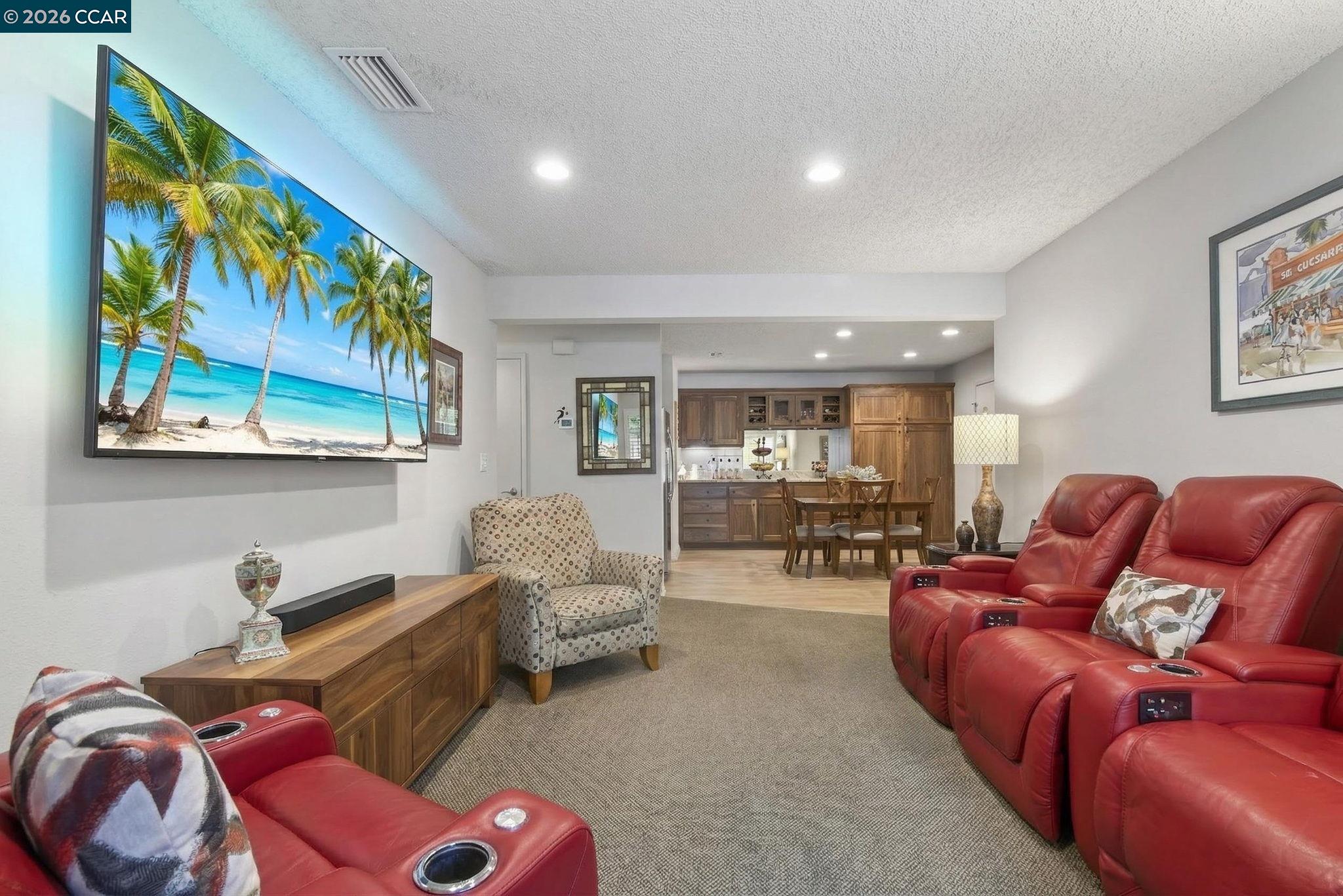 5015 Valley Crest Drive, Unit 121 Concord, CA 94521 - Photo 13 of 30 a living room with furniture and painting on the wall