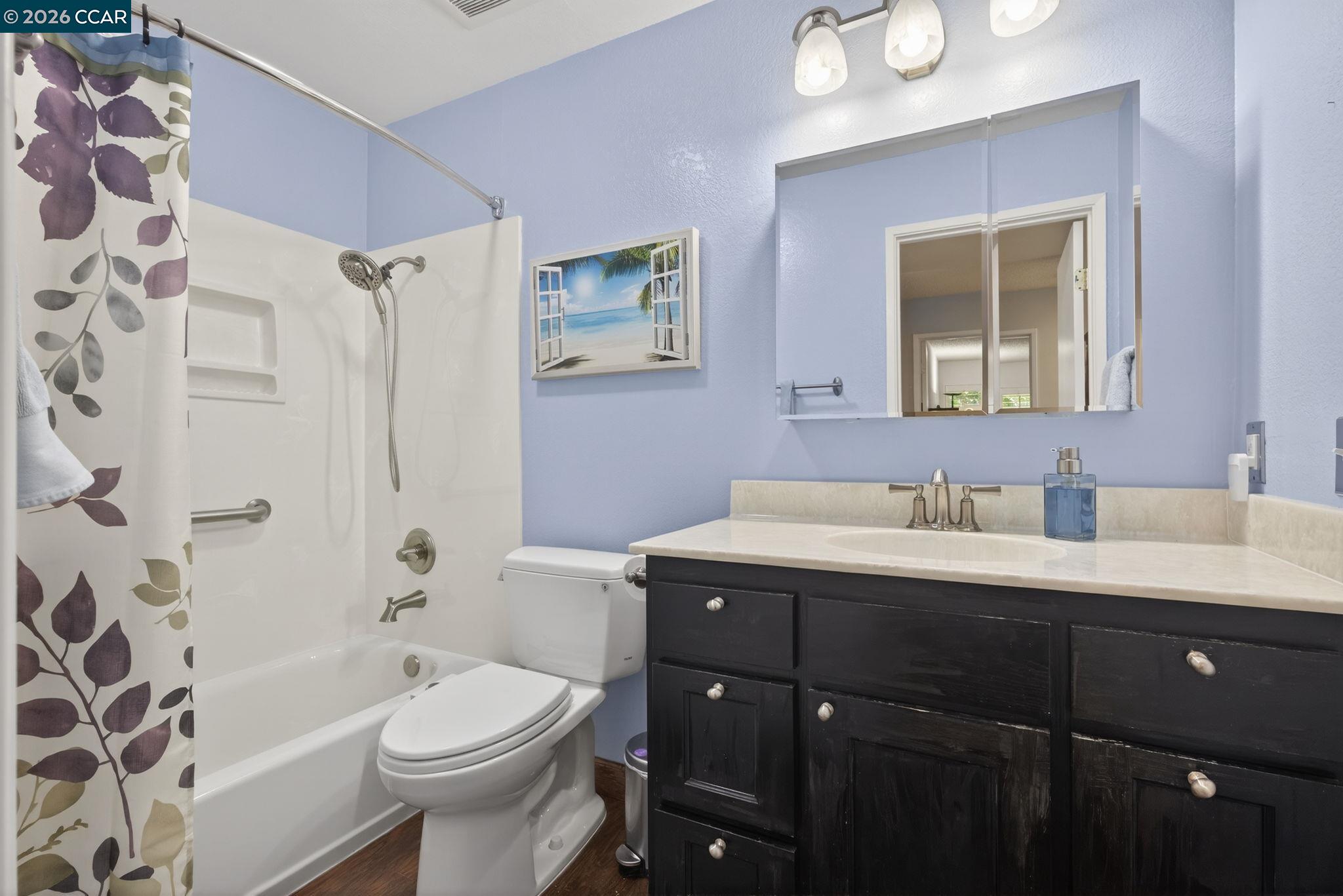 5015 Valley Crest Drive, Unit 121 Concord, CA 94521 - Photo 18 of 30 a bathroom with a sink toilet and shower