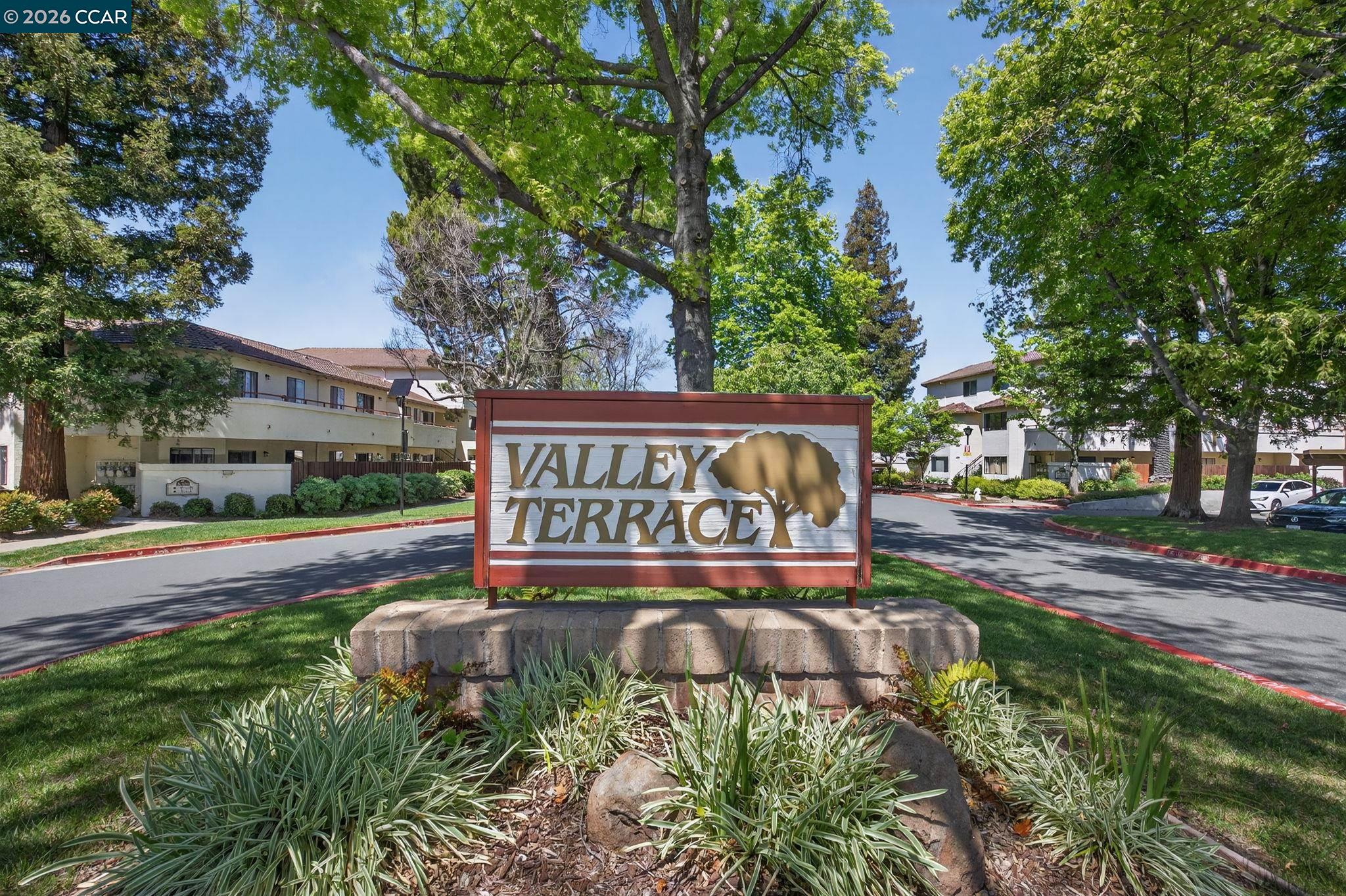 5015 Valley Crest Drive, Unit 121 Concord, CA 94521 - Photo 30 of 30 a sign on the side of the road