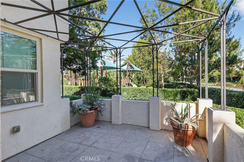 282 Borrego Irvine, CA 92618 - Photo 21 of 24 a view of a chair and tables in the patio