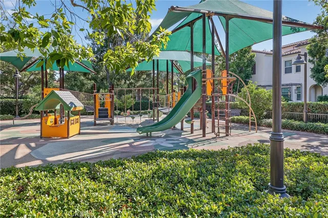 a view of a yard with palm trees